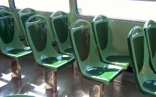 butacas de color verde de autocar